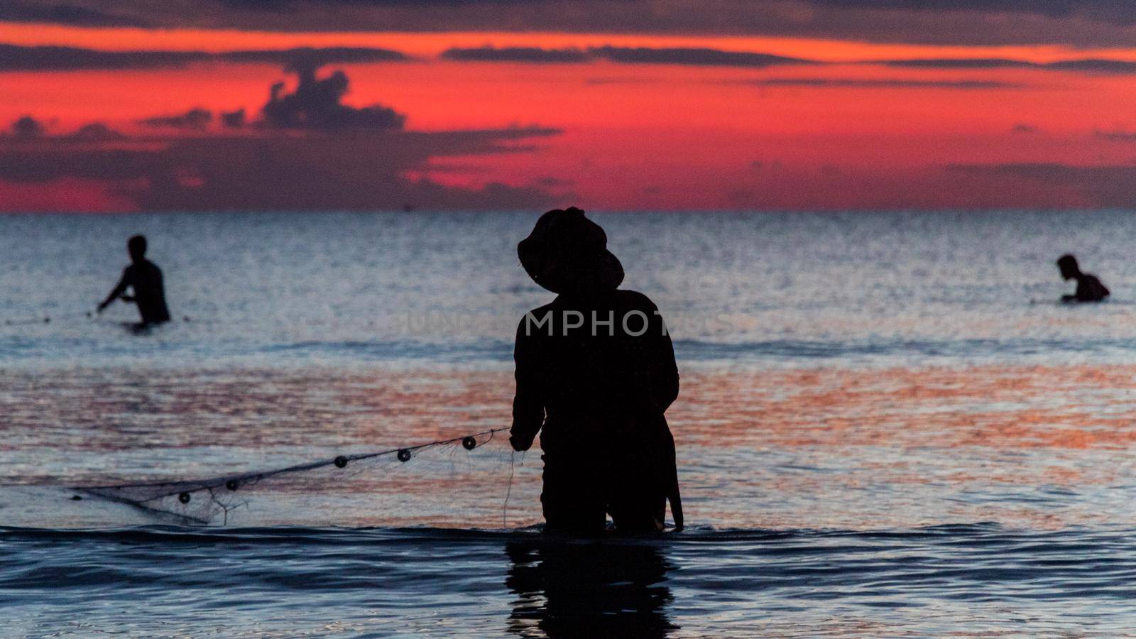 A fisherman is fishing at Sunset on Koh Rong