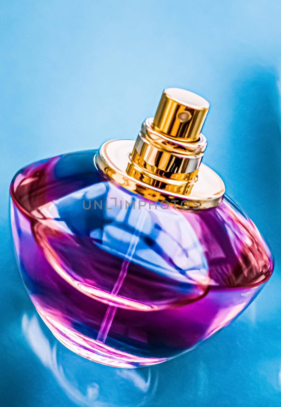 Perfume bottle on glossy background, sweet floral scent, glamour fragrance and eau de parfum as holiday gift and luxury beauty cosmetics brand design.