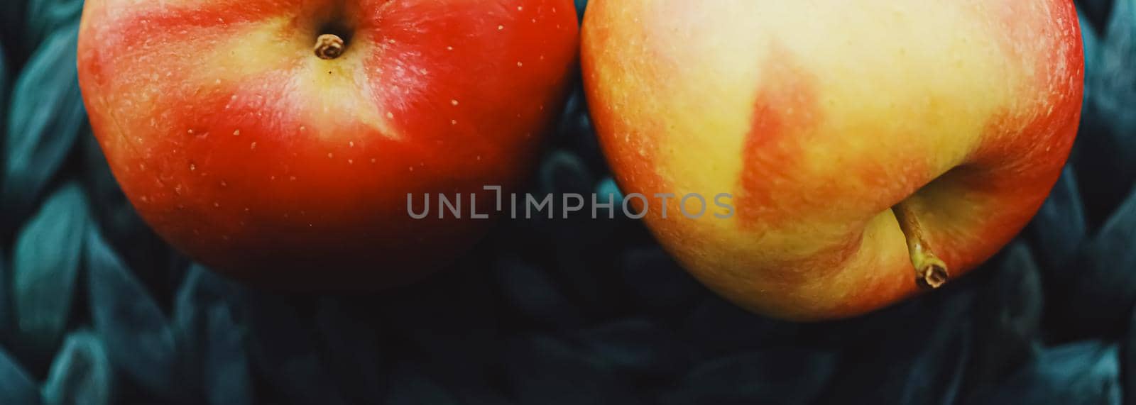 Two fresh ripe small apples, fruits and organic food concept