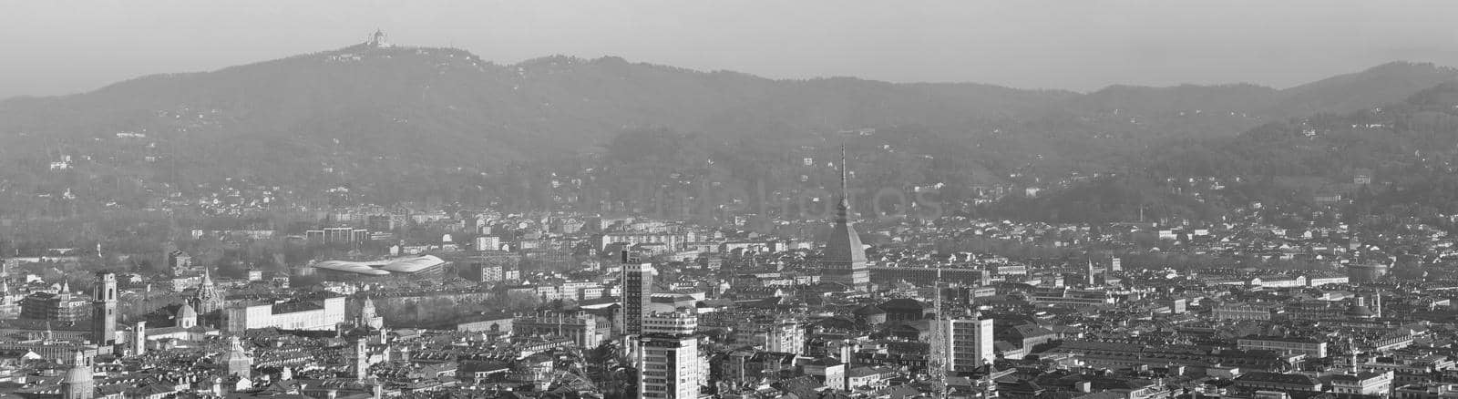 Wide panoramic aerial view of the city of Turin, Italy in black and white
