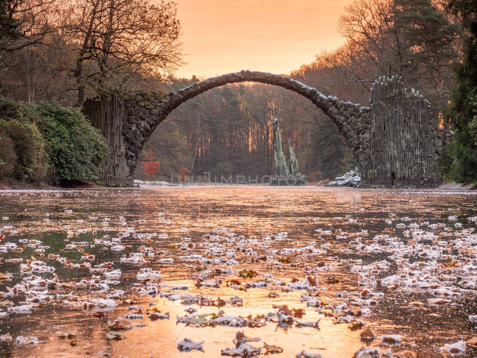 Winter night end at Rakotzbrucke also known as Devils Bridge in Kromlau. Amazing place in Germany.