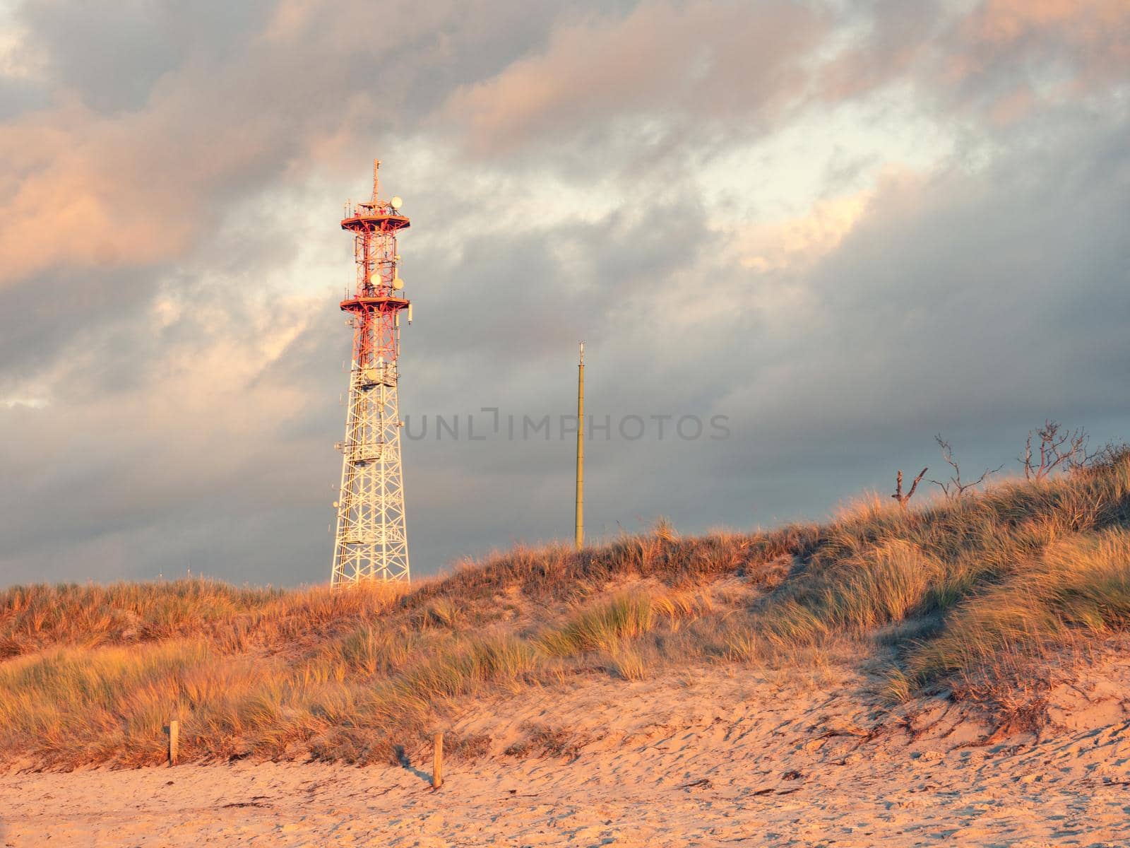 Modern telecommunication tower with antennas and satellites. by rdonar2