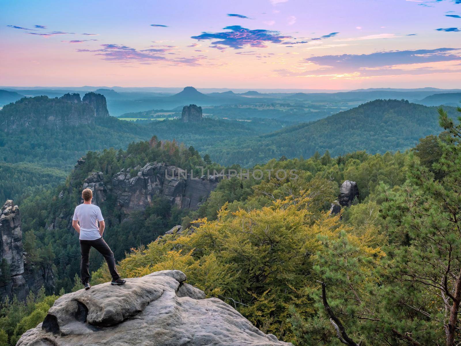 View from Carolafelsen to Grossen Dom and jagged mountains Schrammsteine and Falkenstein in Saxon Switzerland in autumn, Germany 