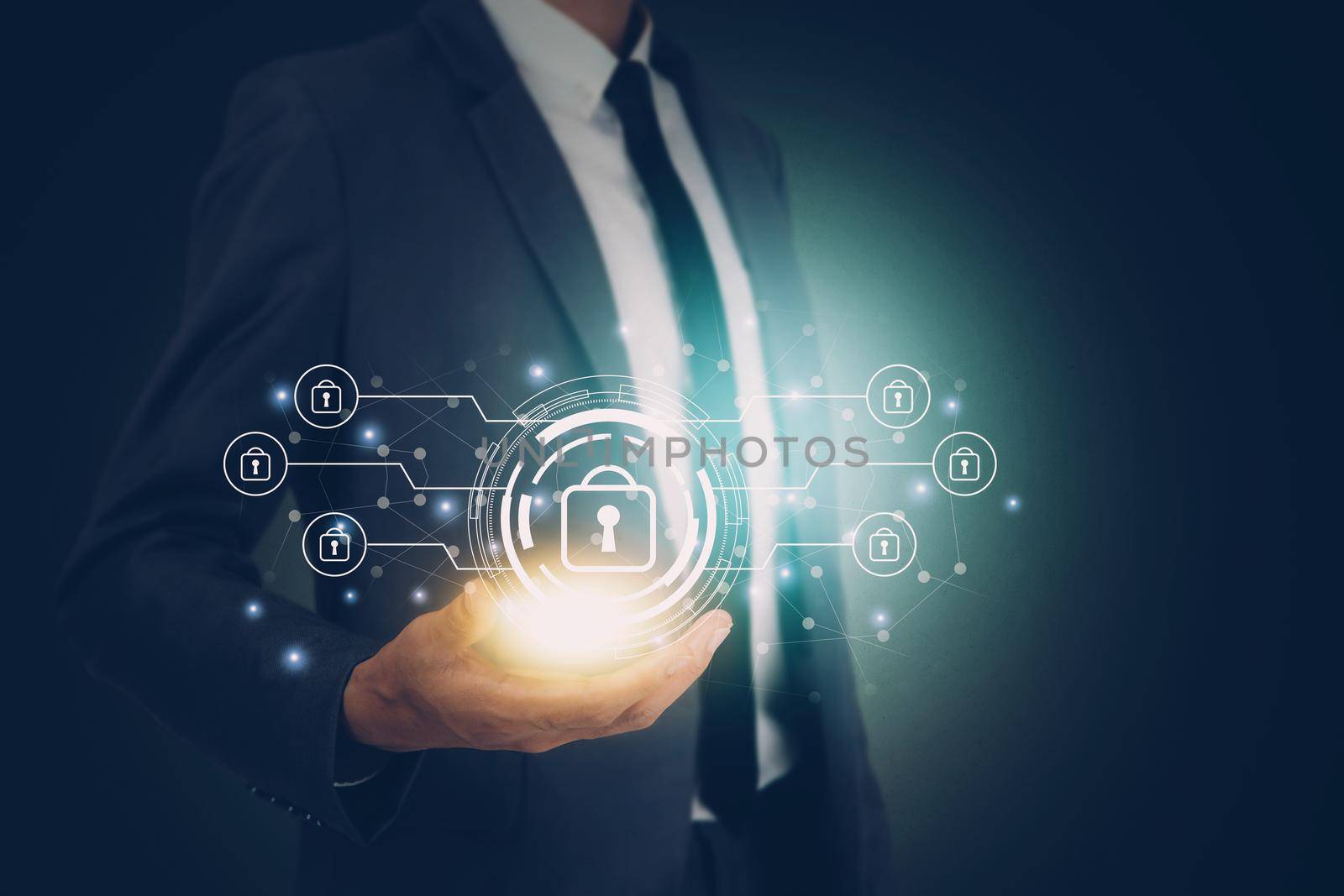 Hand of businessman holding virtual lock icon while cyber security, access data and privacy with protection digital, innovation of system protect for identity, business futuristic concept.