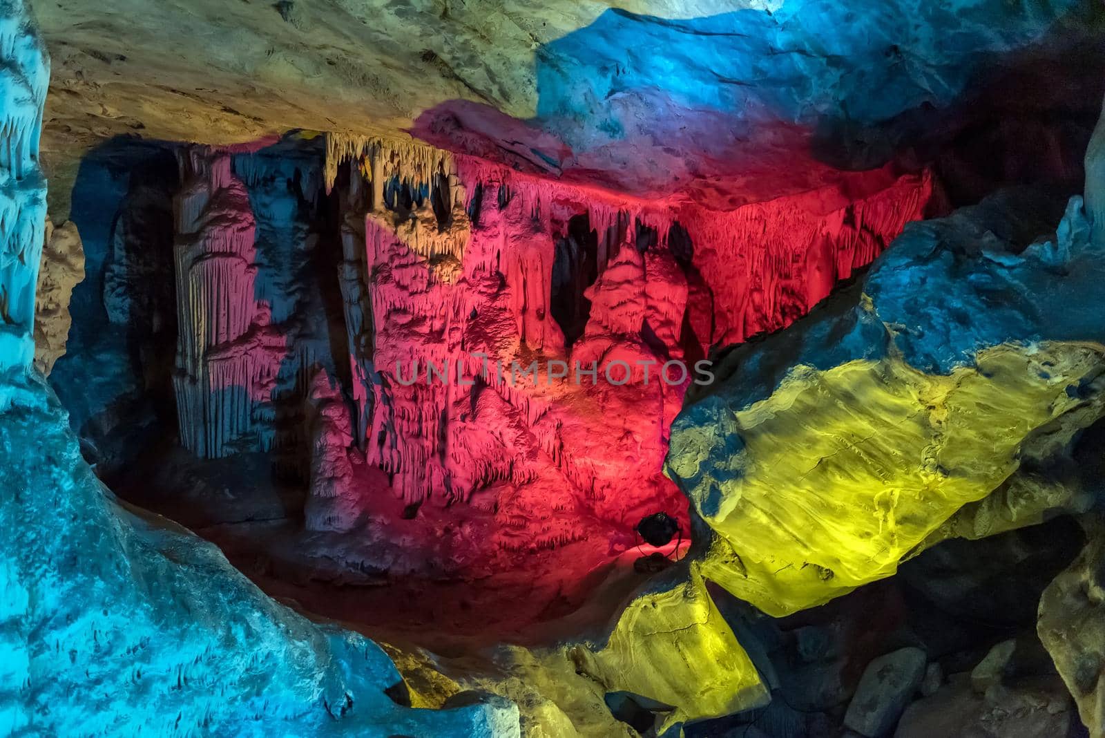 Red colored stalagmites and stalactites in the Cango Caves by dpreezg