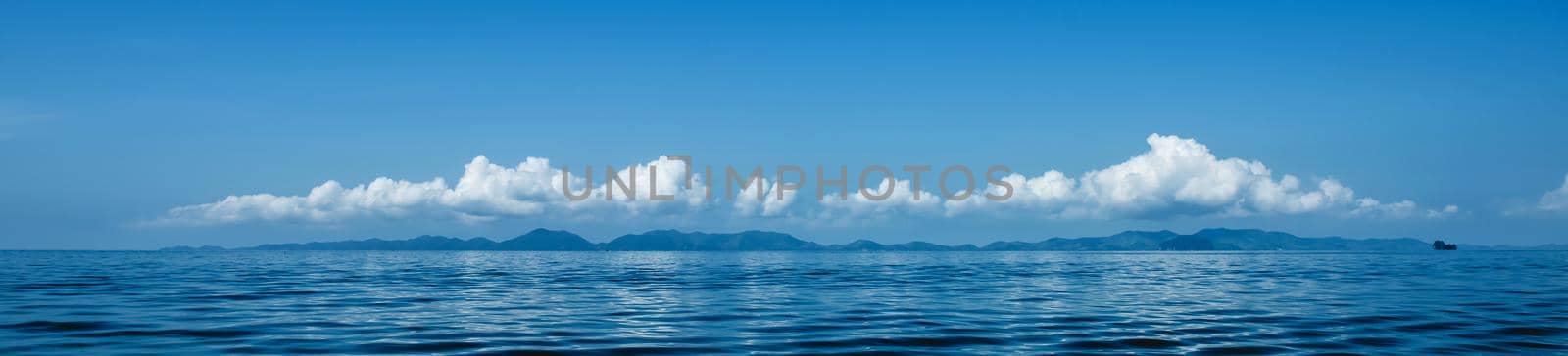 Panoramic beautiful seascape with cloud on a sunny day. by thanumporn