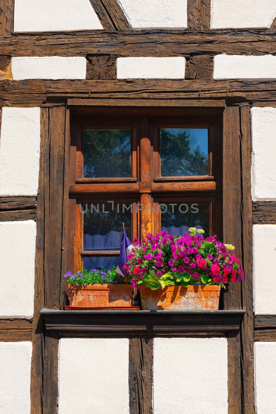 Wall and windows of traditional old house in Strasbourg, France