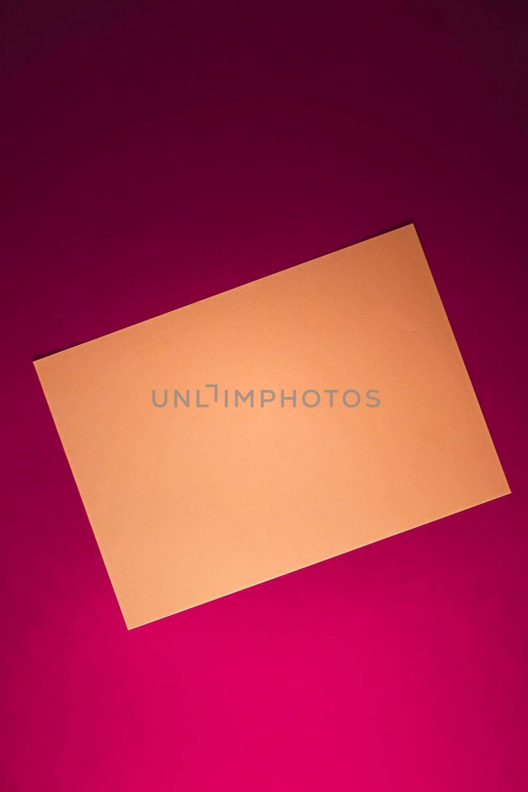 Blank A4 paper, brown on pink background as office stationery flatlay, luxury branding flat lay and brand identity design for mockup.