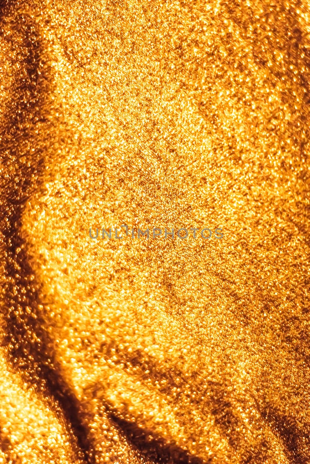 Luxe glowing texture, night club branding and New Years party concept - Golden holiday sparkling glitter abstract background, luxury shiny fabric material for glamour design and festive invitation