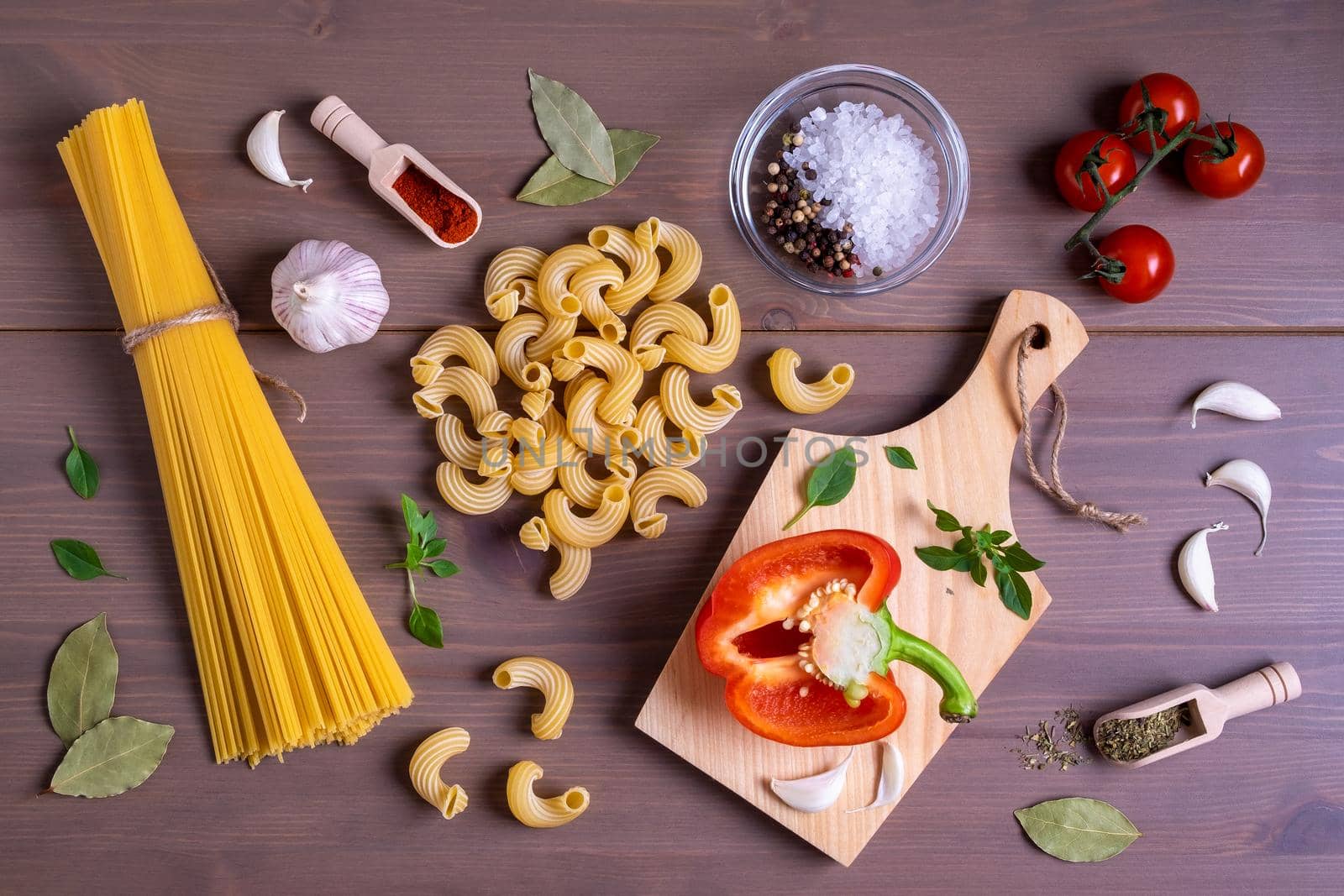 Close-up top view of ingredients for making Italian pasta. Healthy and wholesome food concept. Selective focus.