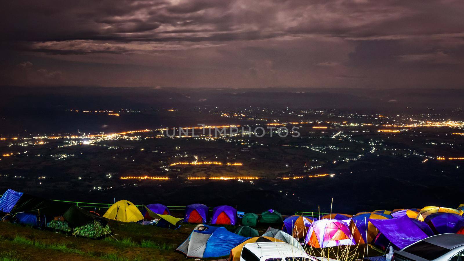 High angle night view see the street light from the campsite at Phu Tub Berk Viewpoint famous tourist attractions of Phetchabun Province, Thailand