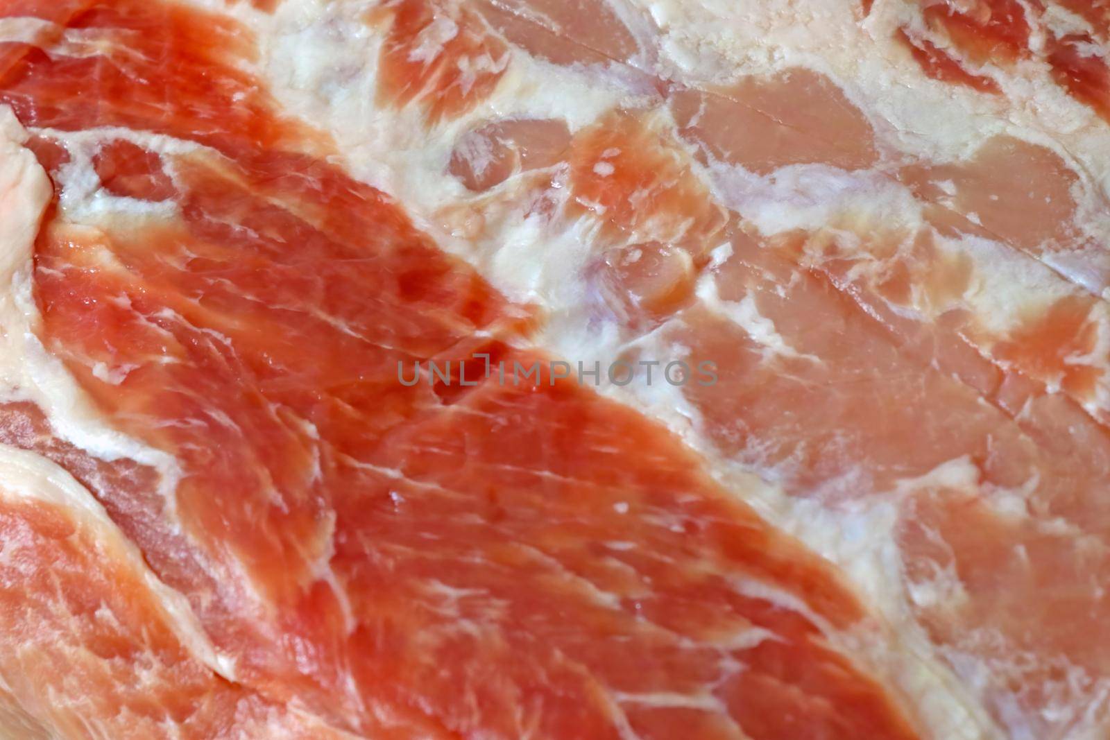 Close-up on a piece of meat on the table, background