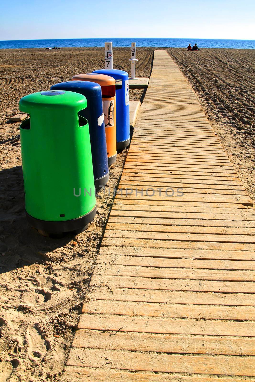 Colorful Recycling bins on the beach in Santa Pola, Alicante