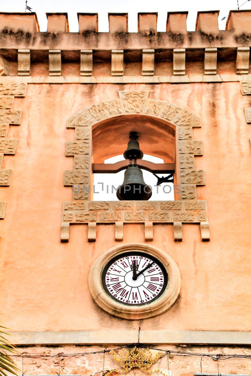 Tower and belfry of the Fortress castle of the fishing village of Santa Pola, Alicante, Spain