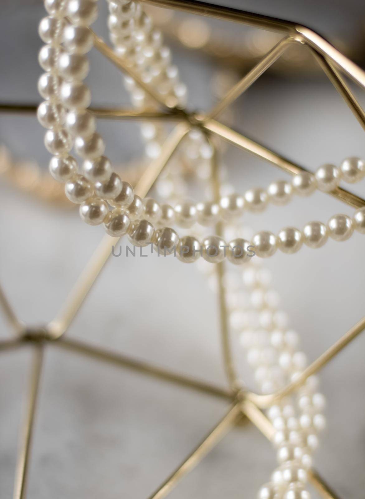 Pearl necklace on golden marble, ethical jewellery - luxury background, jewelry as a gift concept. Pearls are girl's best friends