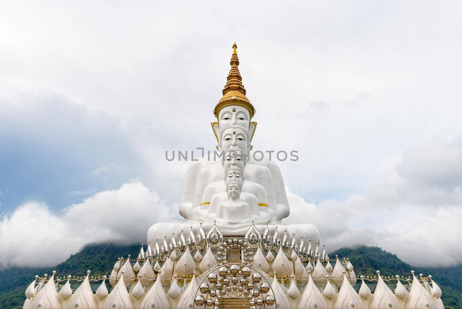 Buddha statue has large white five body on mountain surrounded by nature with cloud fog cover at Wat Phra That Pha Sorn Kaew Temple is a tourist attractions in Khao Kho, Phetchabun, Thailand