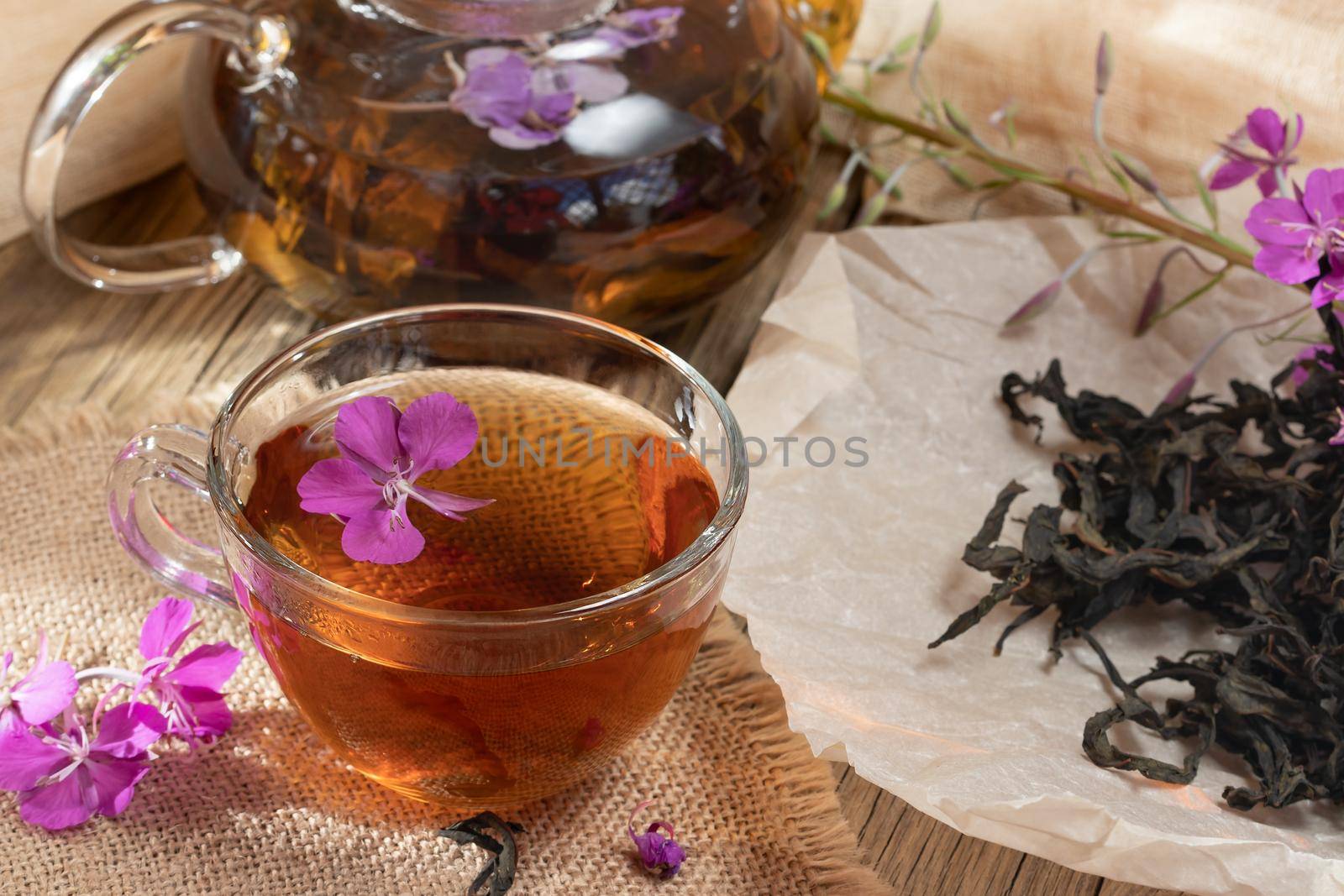 Herbal tea made from fireweed known as blooming sally in teapot and cup.