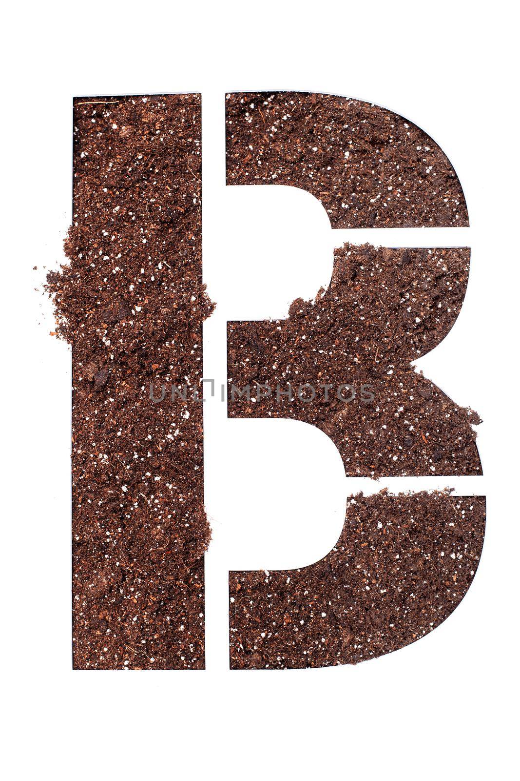 stencil letter B made above dirt on white surface by kokimk