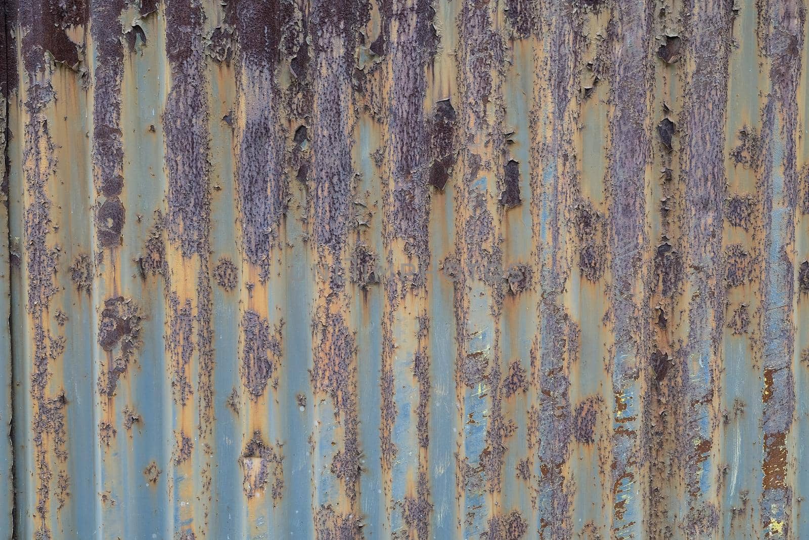 Texture painted rusted metal, colored background with iron fence. grunge green-yellow old dirty abstract Background.