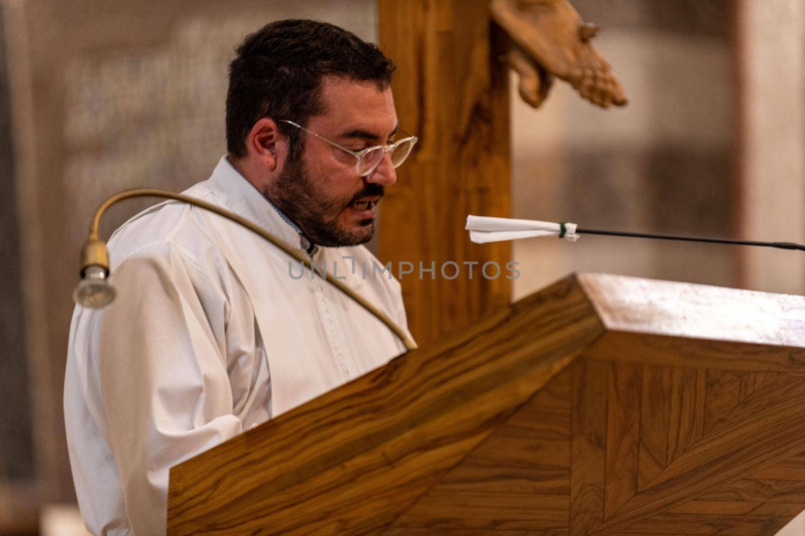 priests during the holy mass in the church of sacro cuore terni by carfedeph