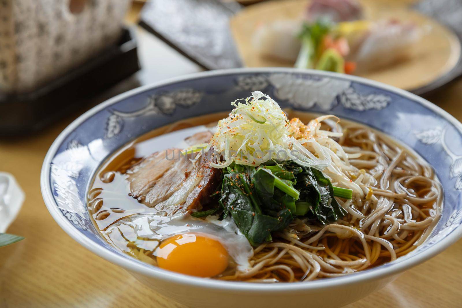 Macro shot of Japanese ramen noodle soup by uphotopia