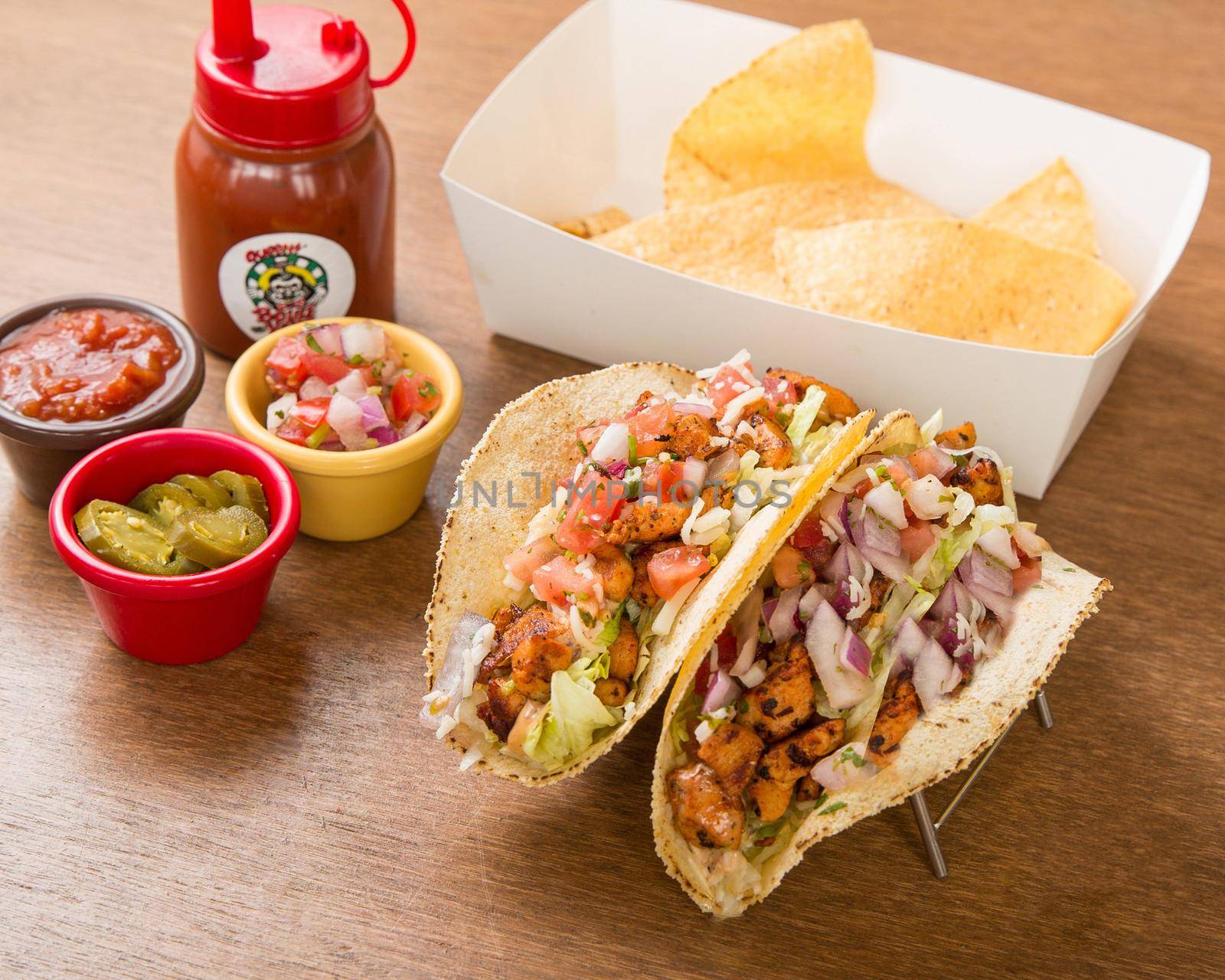 Mix of Mexican food on restaurant table by uphotopia