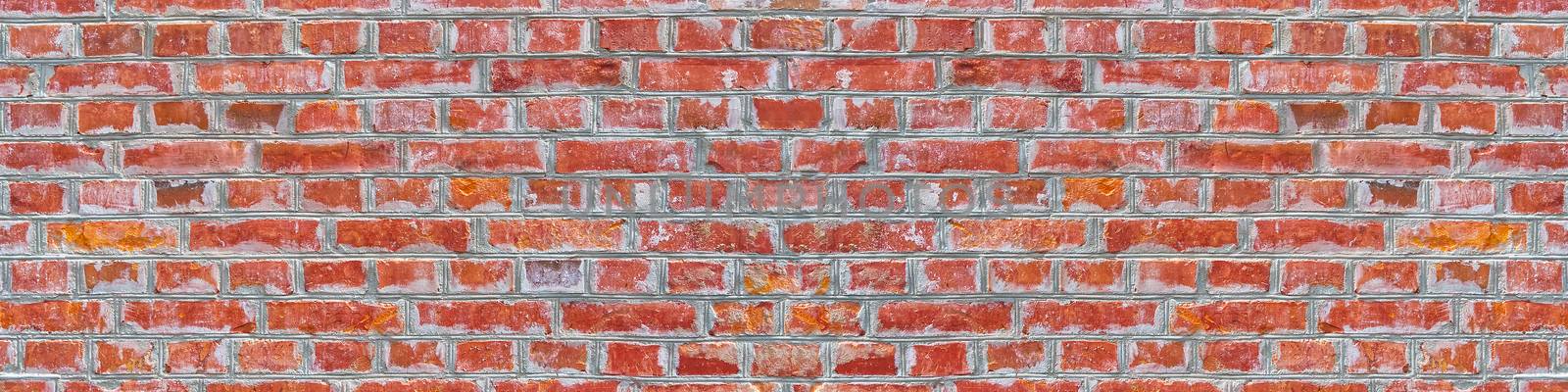 Panoramic rugged old red brown bricks wall texture. vintage retro industrial banner background