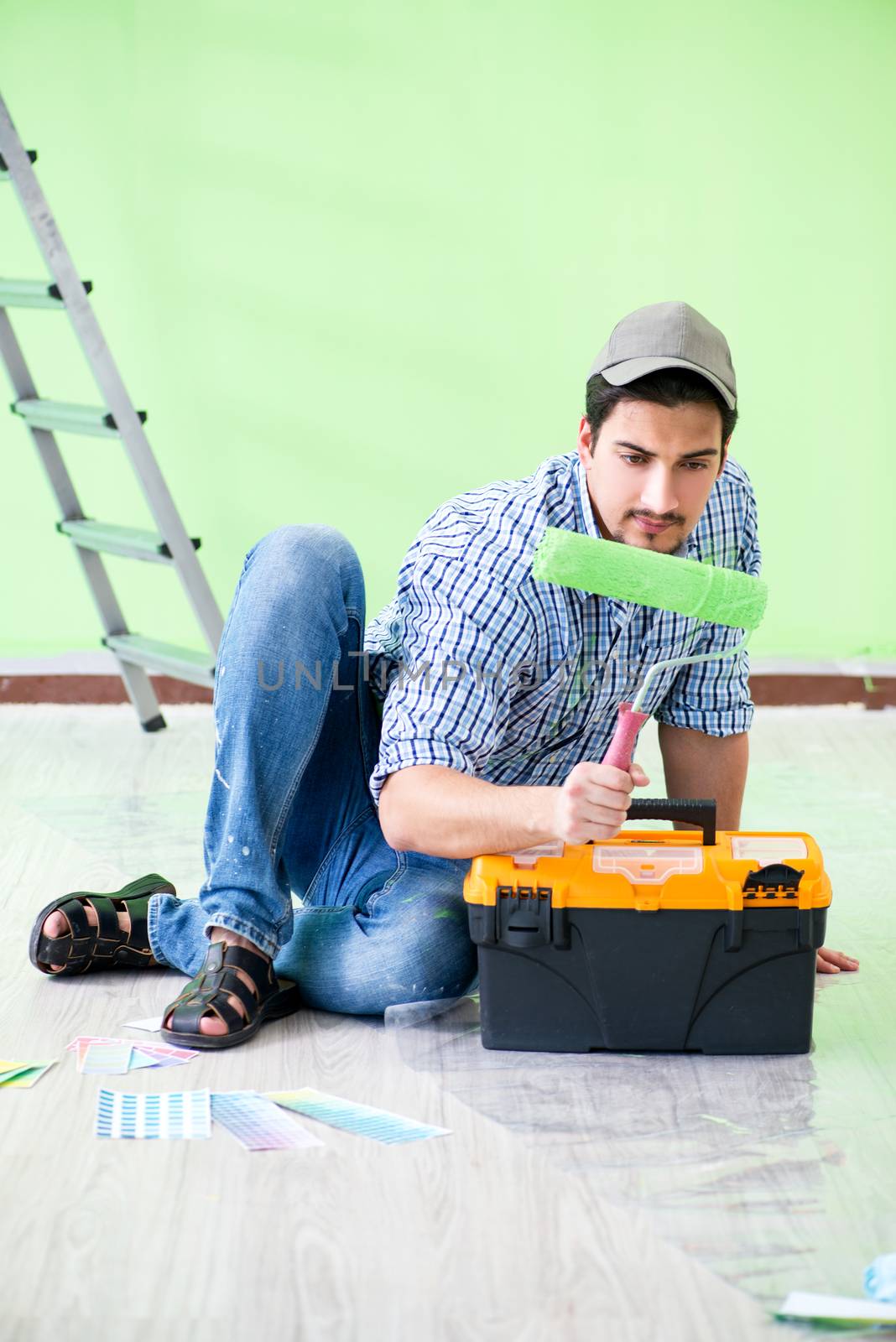 Young man doing home renovation 