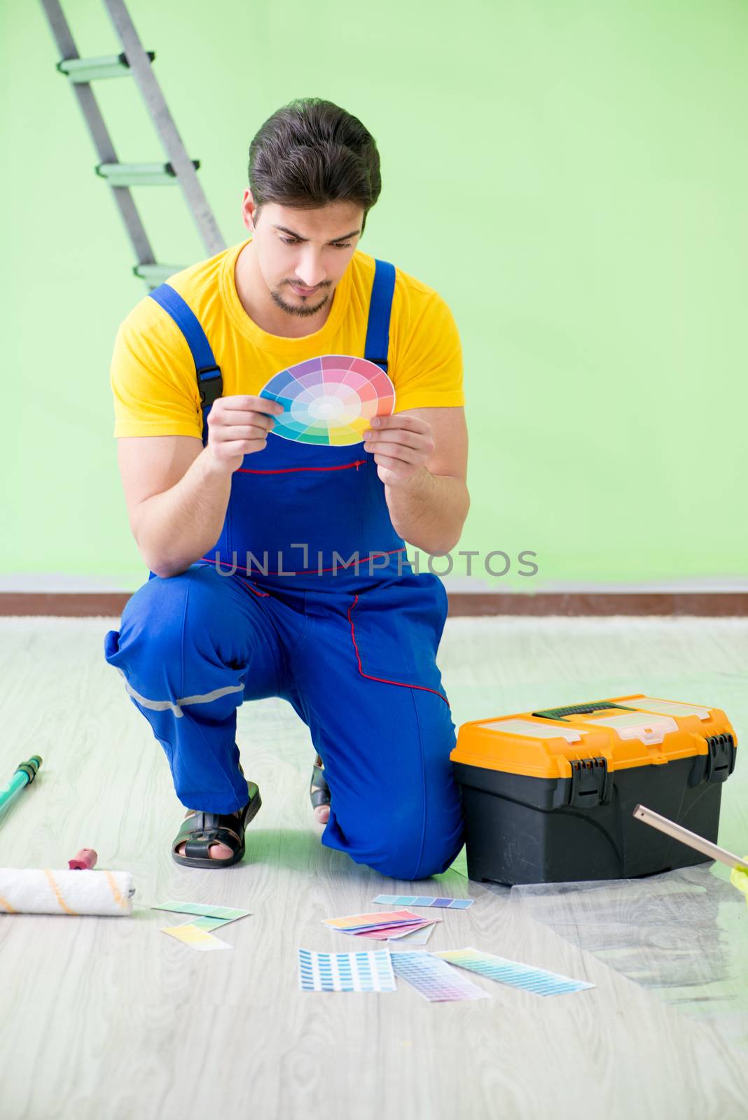 Young man doing home renovation 