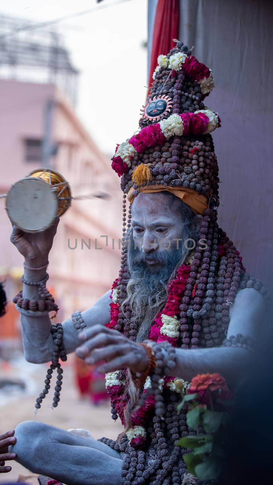 Haridwar, Uttarakhand, India April 12, 2021. Indian Saints in their traditional way of Yog Mudra, meditating. Sitting in silence as part of the initiation of new sadhus during Kumbha Mela. The Naga Sadhus.