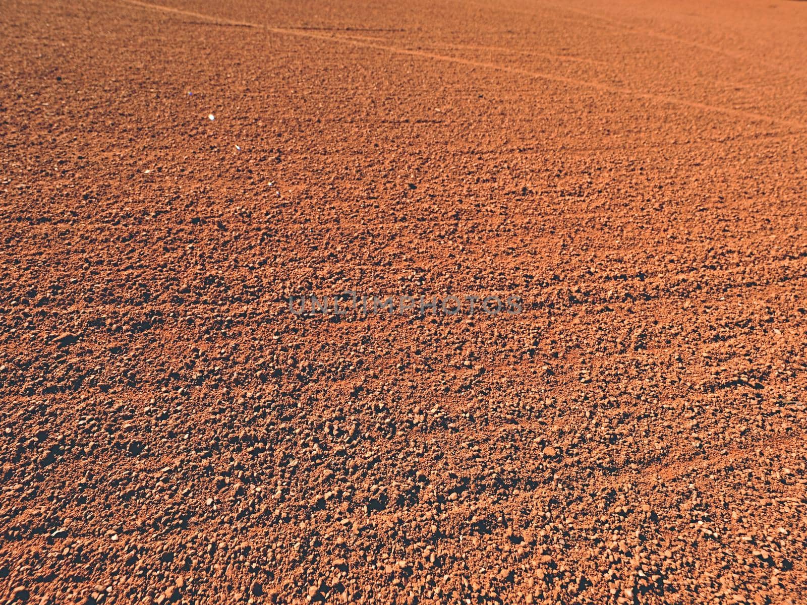 Footprints and service marks on a outside  tennis court, details