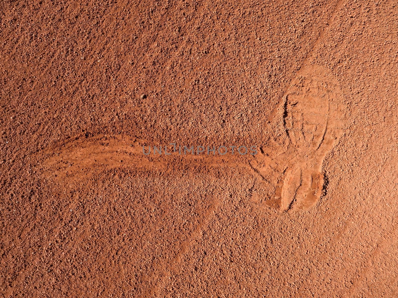 Footprints and service marks on a outside  tennis court, details