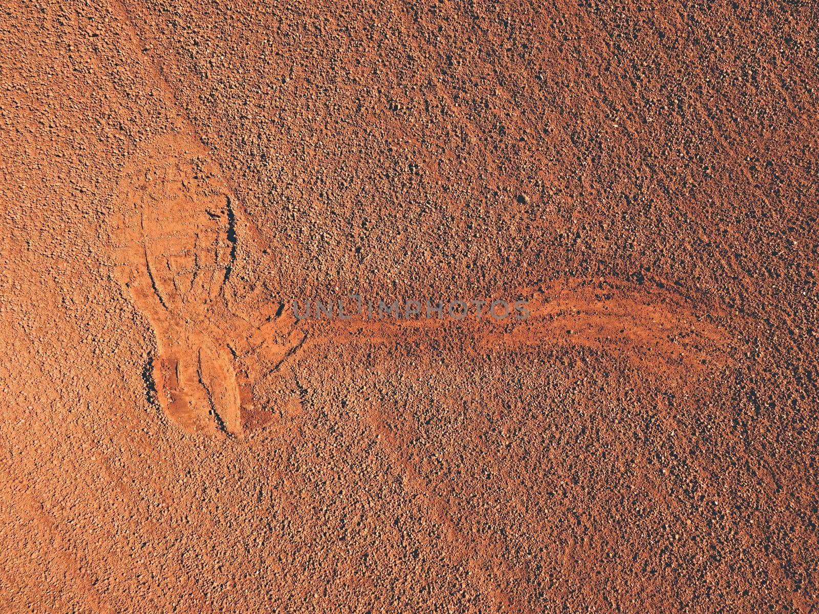 Footprints and service marks on a outside  tennis court, details