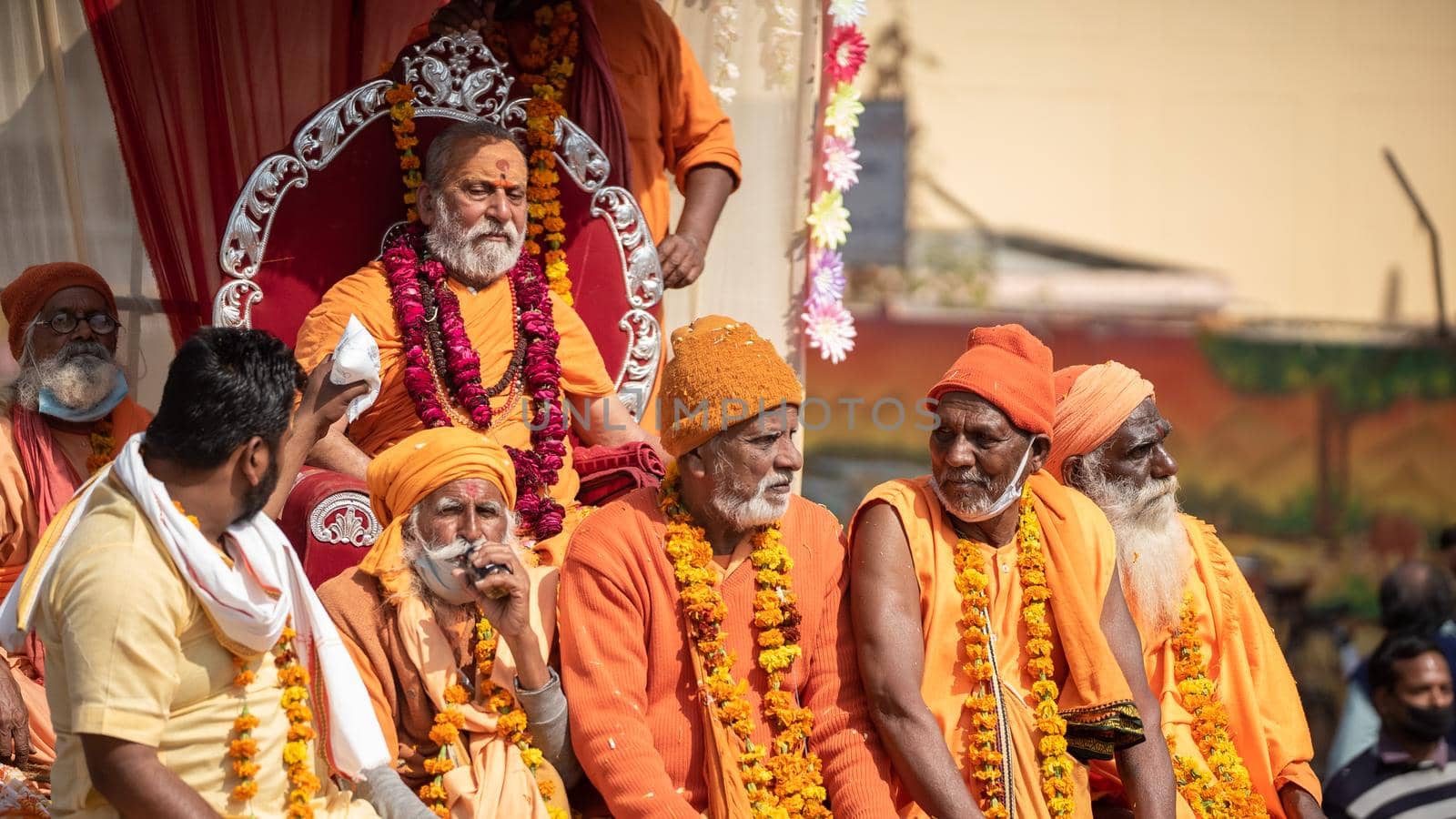 Haridwar, Uttarakhand. India- March 5, 2021- Indian sadhus coming to Kumbh Mela, Royal welcome. Sadhus sitting in rides, wearing a garland,