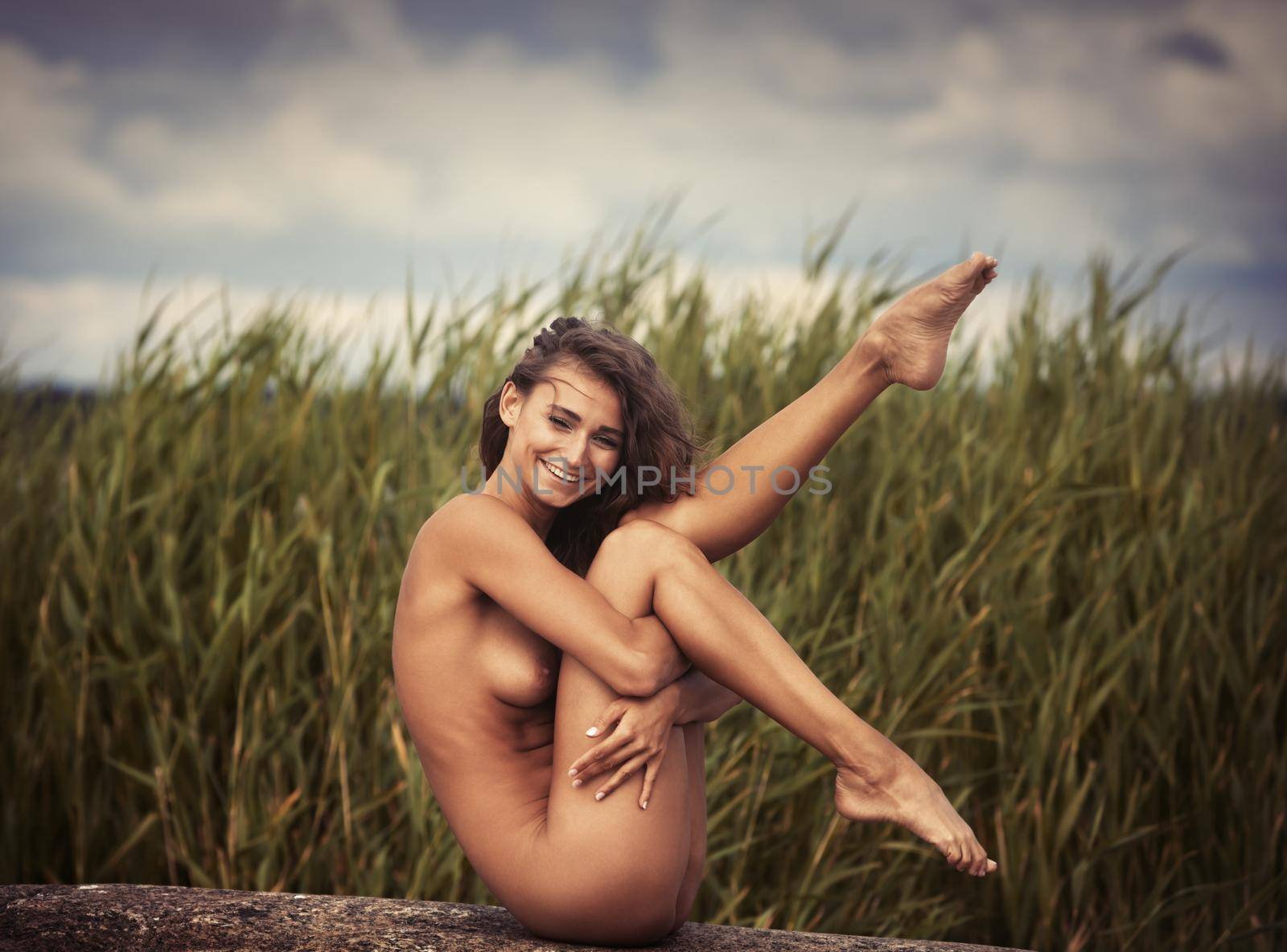 nude woman on nature background by palinchak