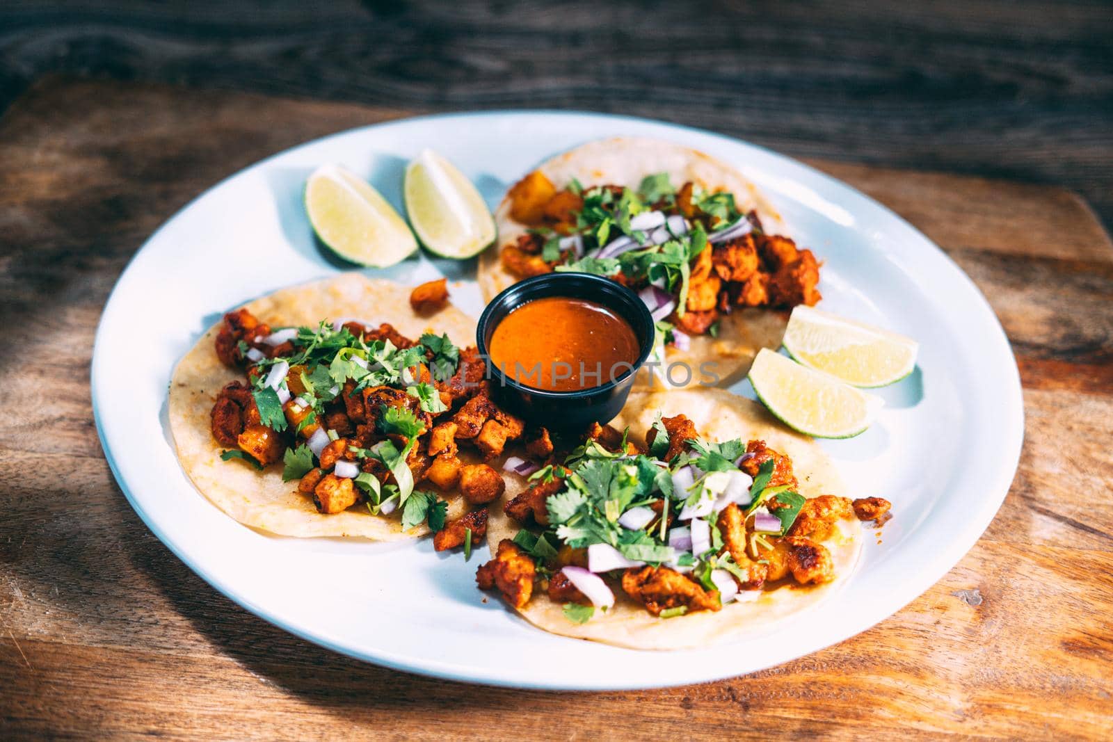 A plate of tacos and tortilla by castaldostudio