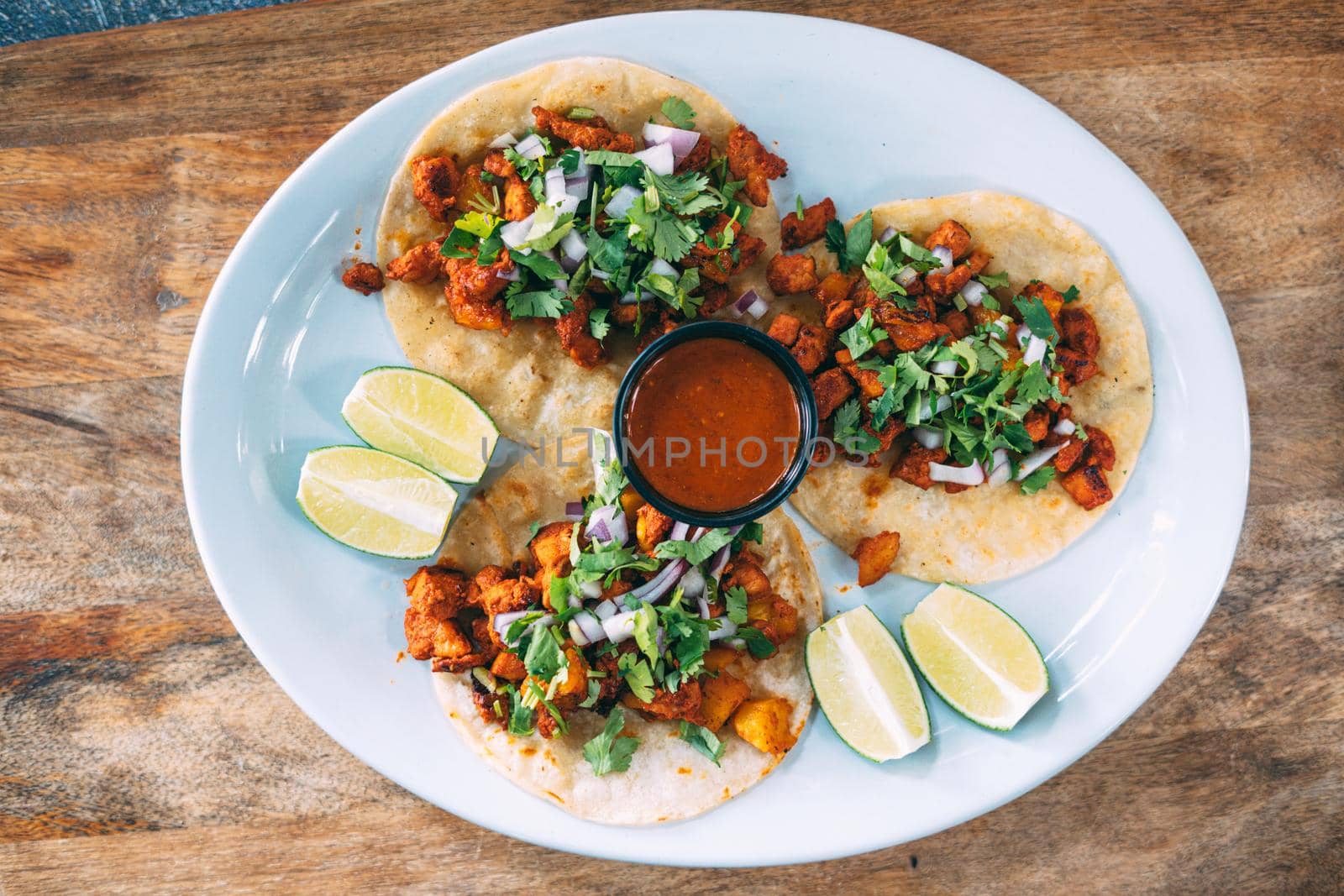 A plate of tacos and tortilla by castaldostudio