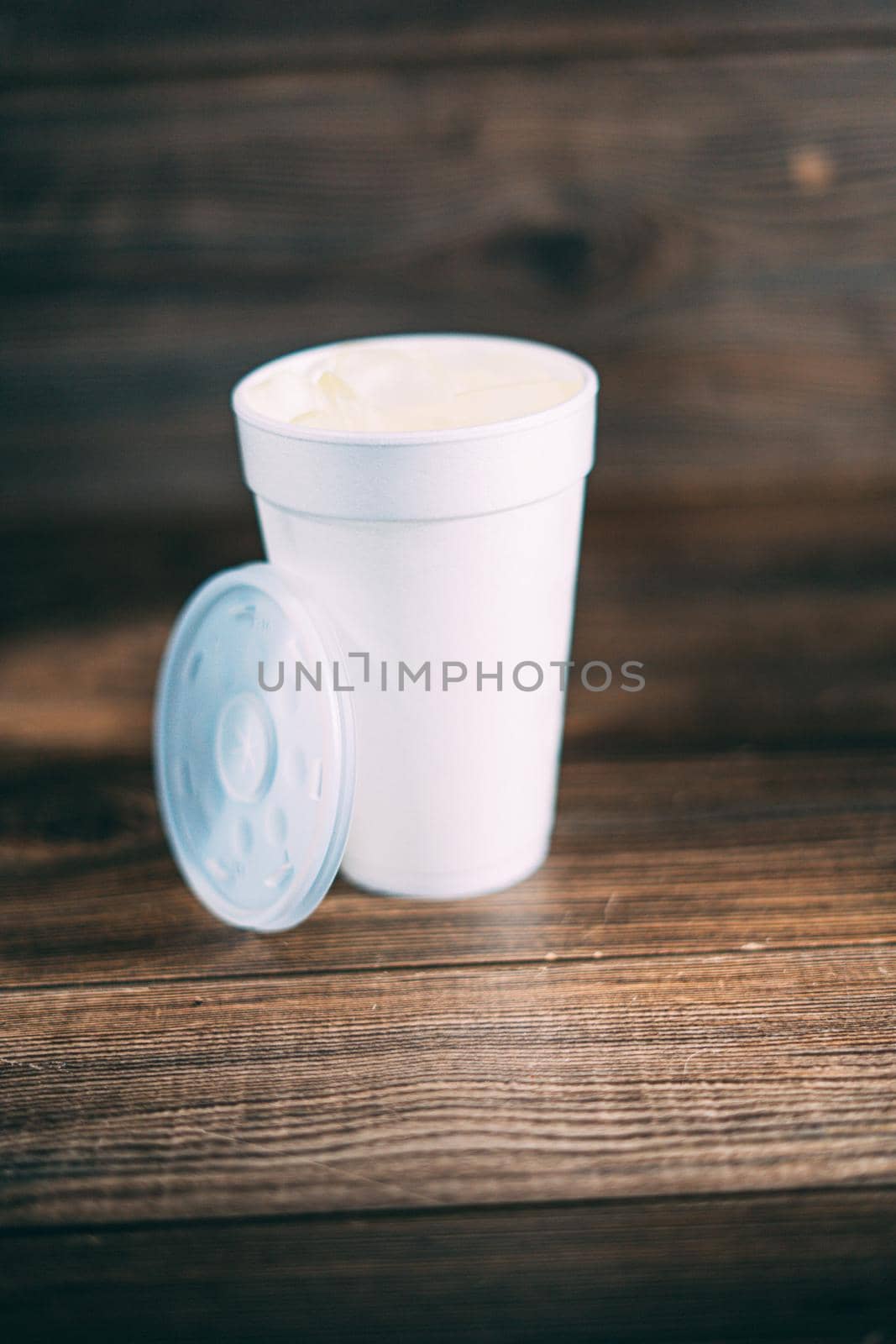 A white disposable styrofoam cup