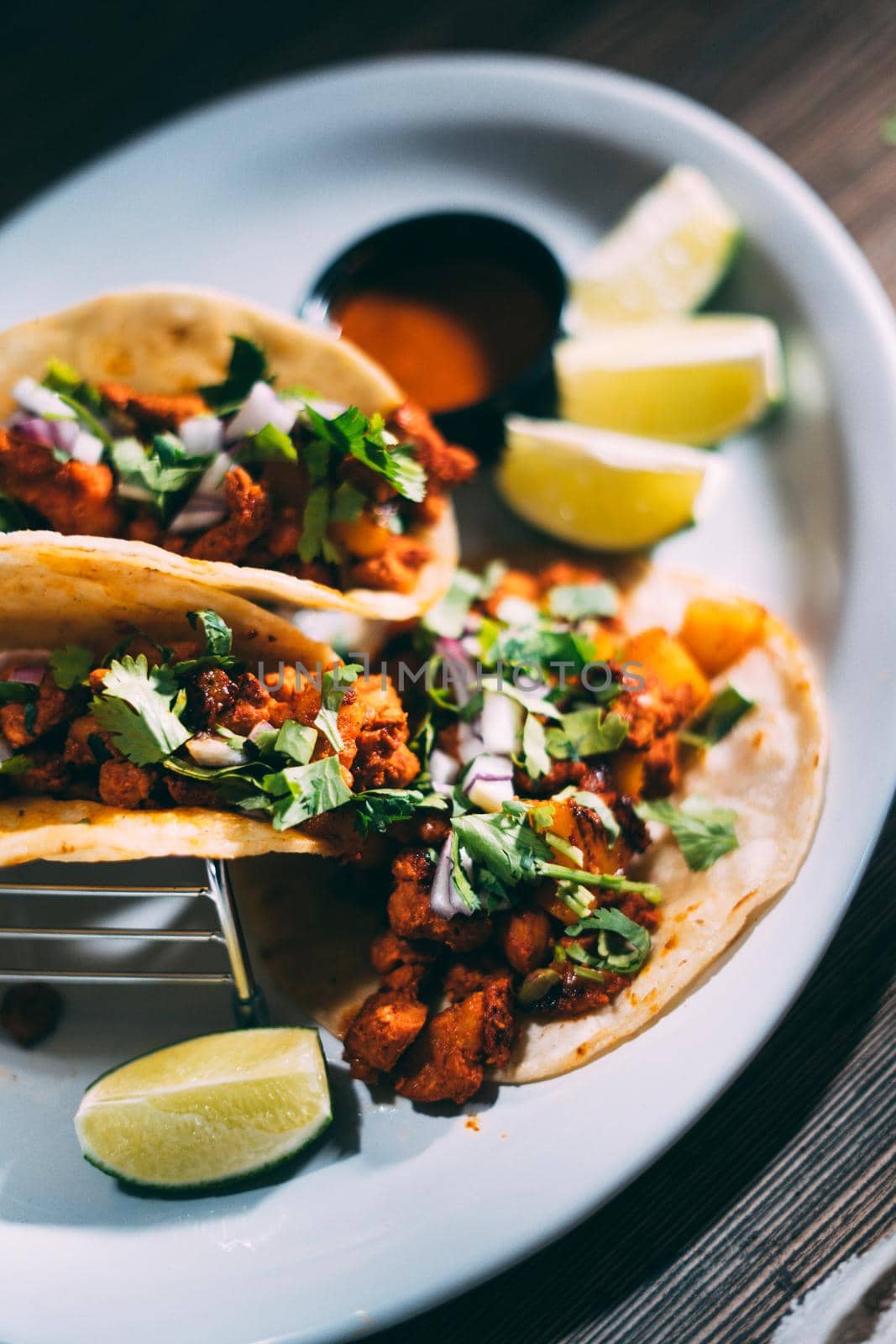 A plate of tacos and tortilla by castaldostudio