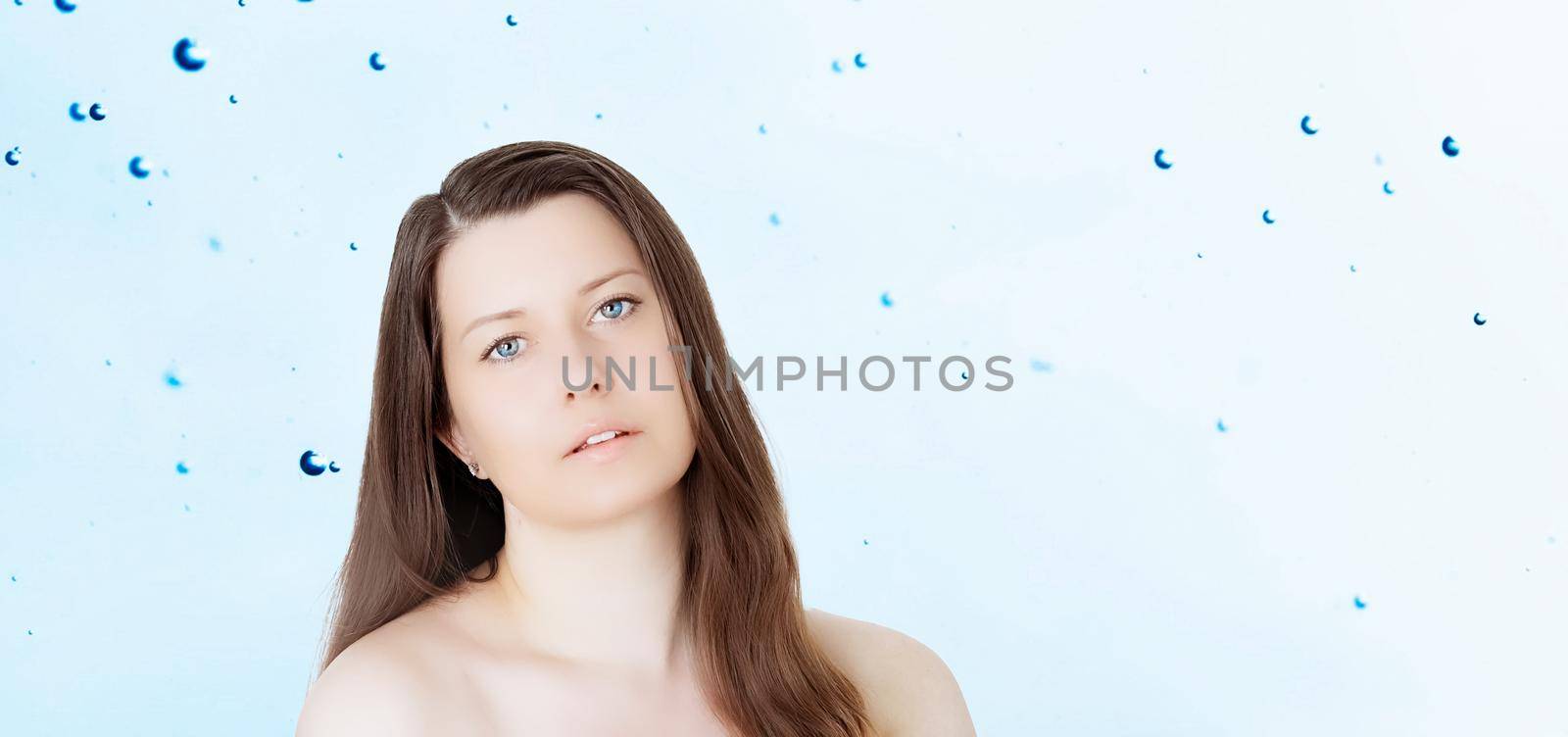 Rejuvenation skincare and beauty ad, beauty face portrait of young woman with healthy clean skin, blue cosmetic liquid drops on background by Anneleven