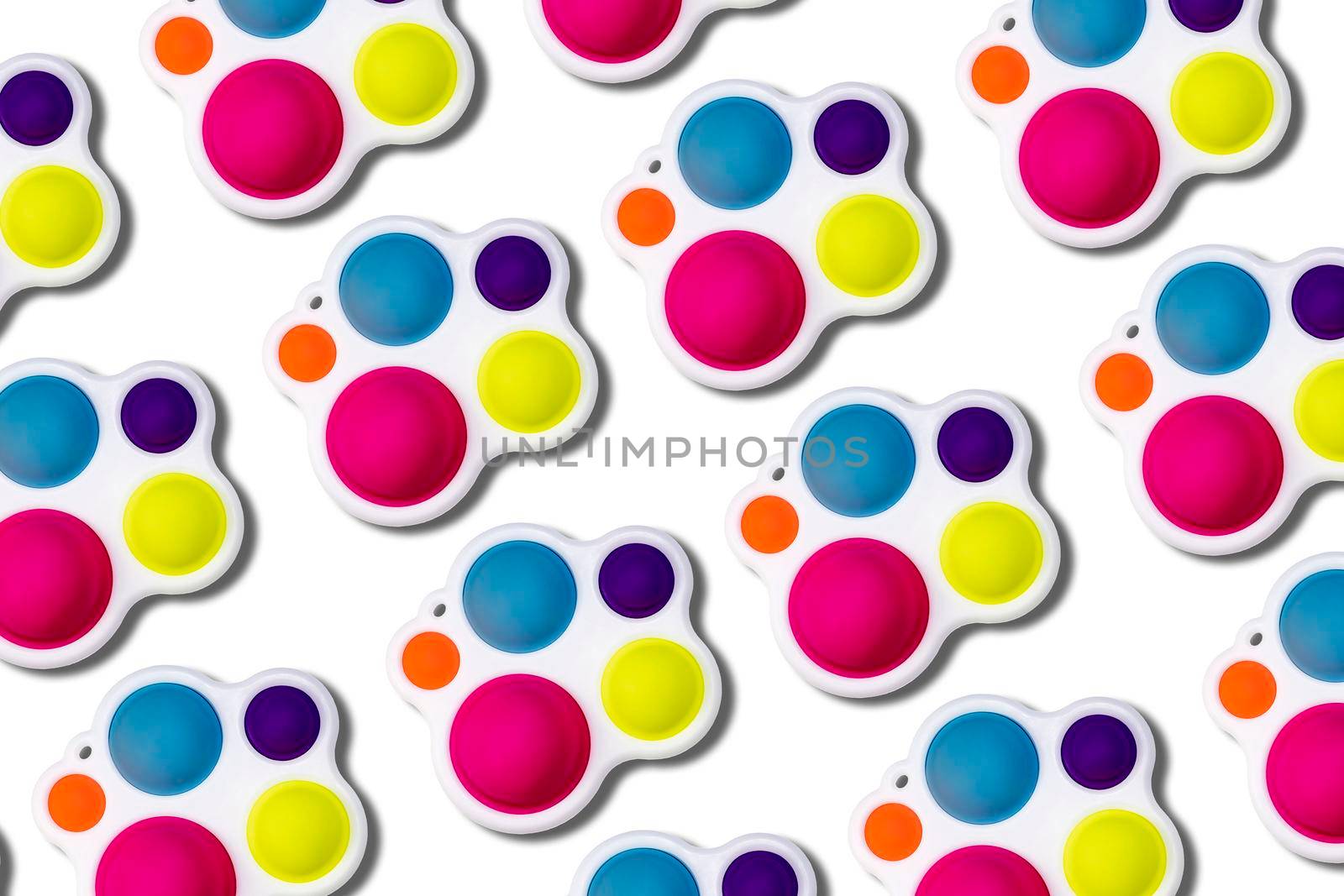 Pattern Colorful simple dimple toys. Isolate on white background. Top view. Fashion game for kids. by Essffes