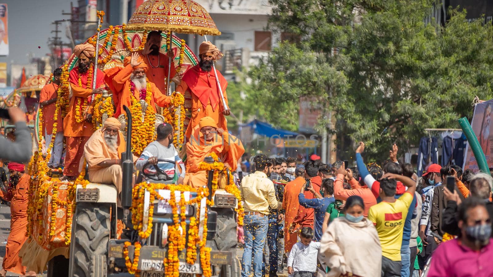 Indian sadhus coming to Kumbh Mela, Royal welcome. Sadhus sitting wearing garland by stocksvids