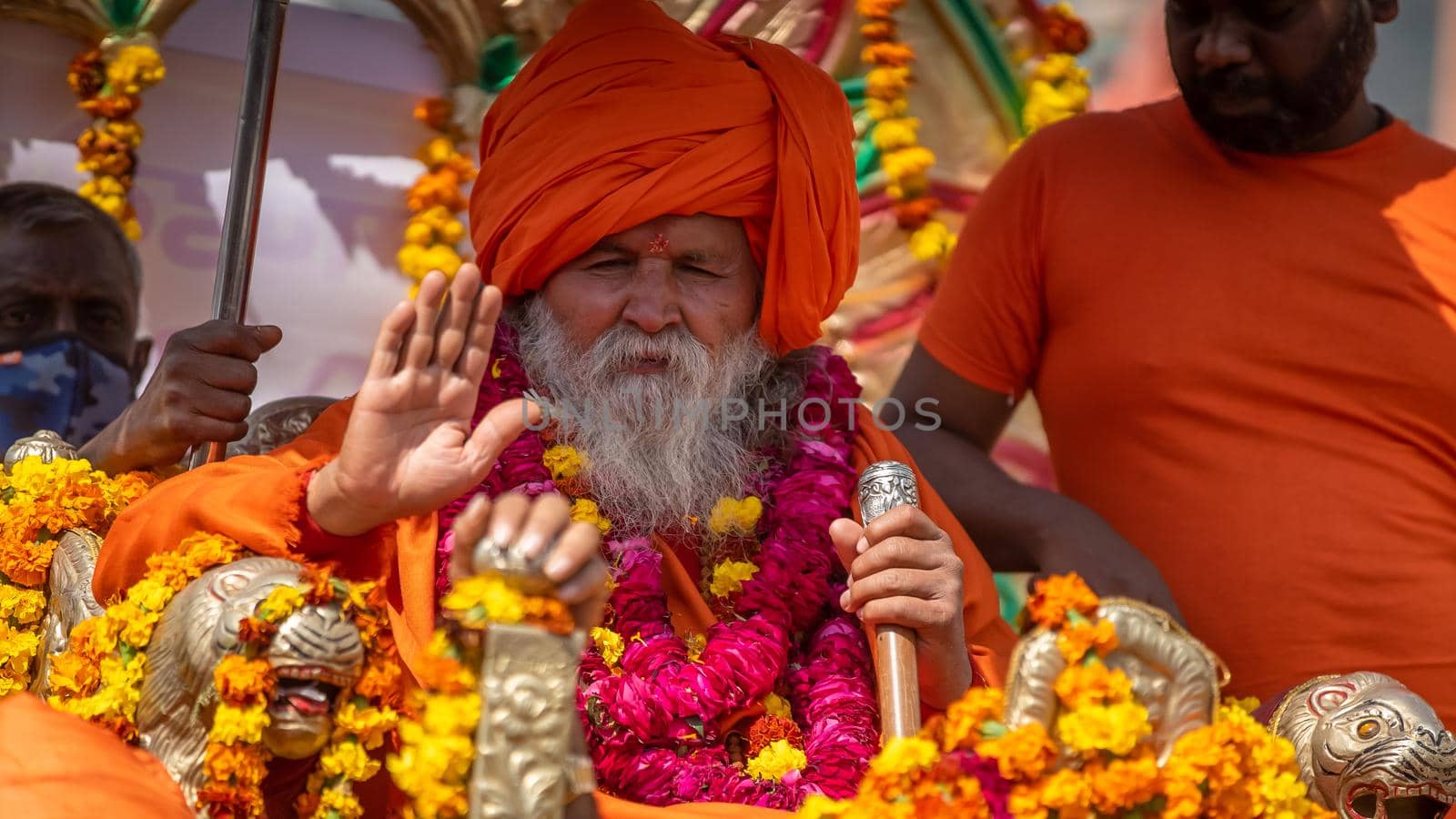 Haridwar, Uttarakhand. India- March 5, 2021- Indian sadhus coming to Kumbh Mela, Royal welcome. Sadhus sitting in rides, wearing a garland,