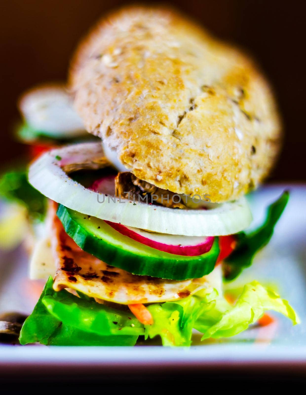 Whole grain sandwich with ham, tomato, mushrooms and egg, fresh organic vegetables by Q77photo