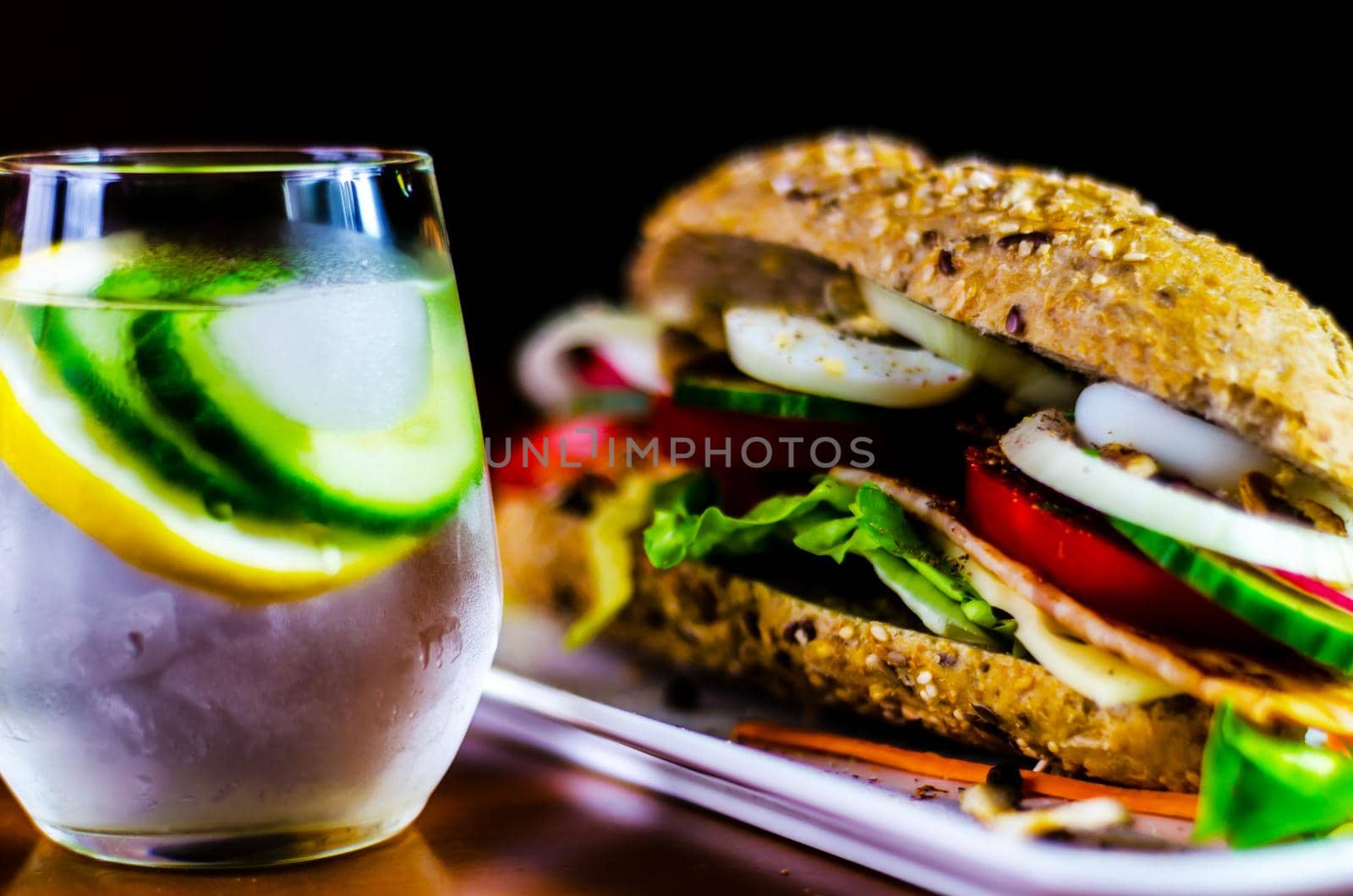 Whole grain sandwich with ham, tomato, mushrooms and egg, fresh organic vegetables by Q77photo