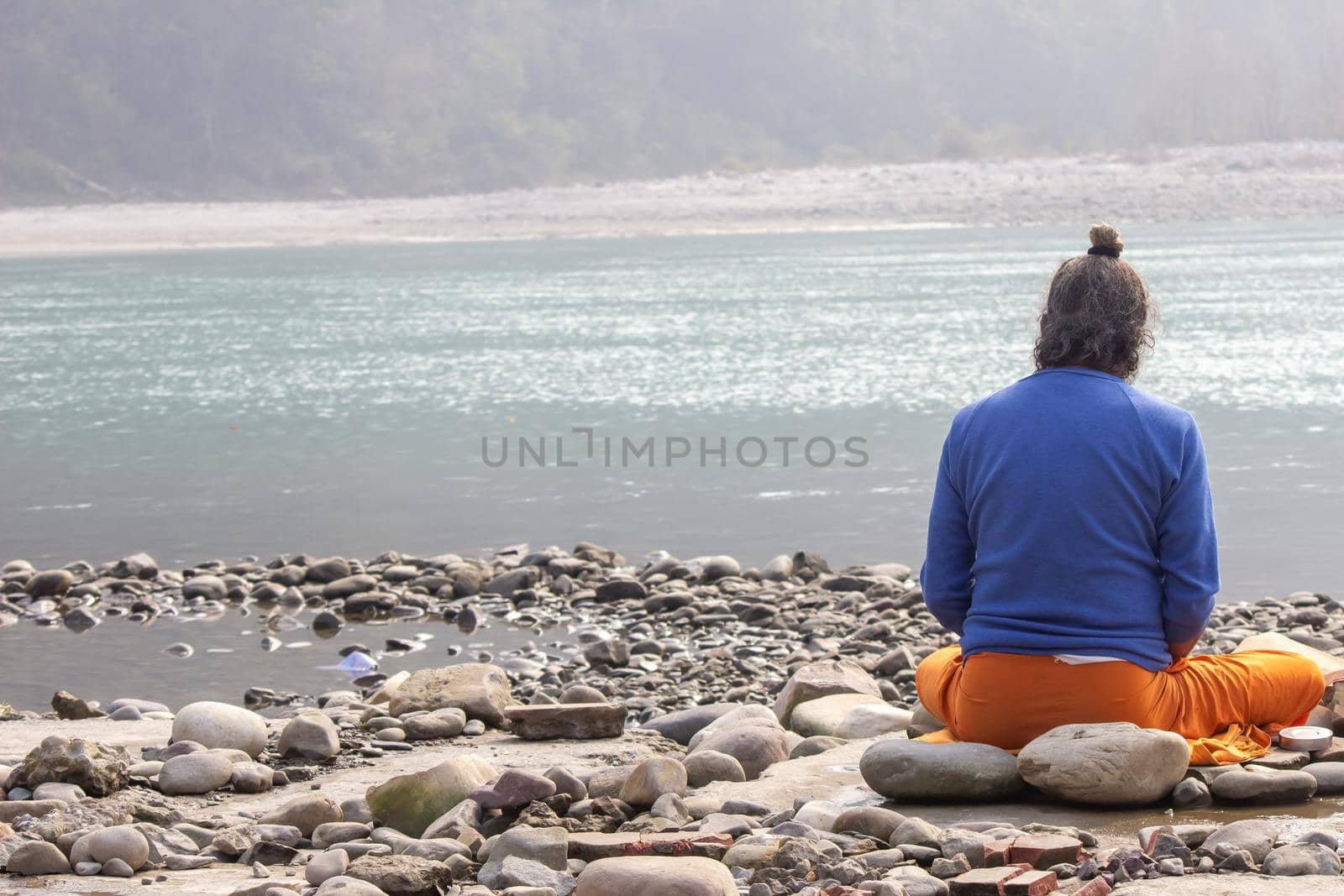 Haridwar, Uttarakhand, India April 12, 2021. Indian Saints in their traditional way of Yog Mudra, meditating. Sitting in silence as part of the initiation of new sadhus during Kumbha Mela. The Naga Sadhus. Apple prores 422 High-quality 4k footage