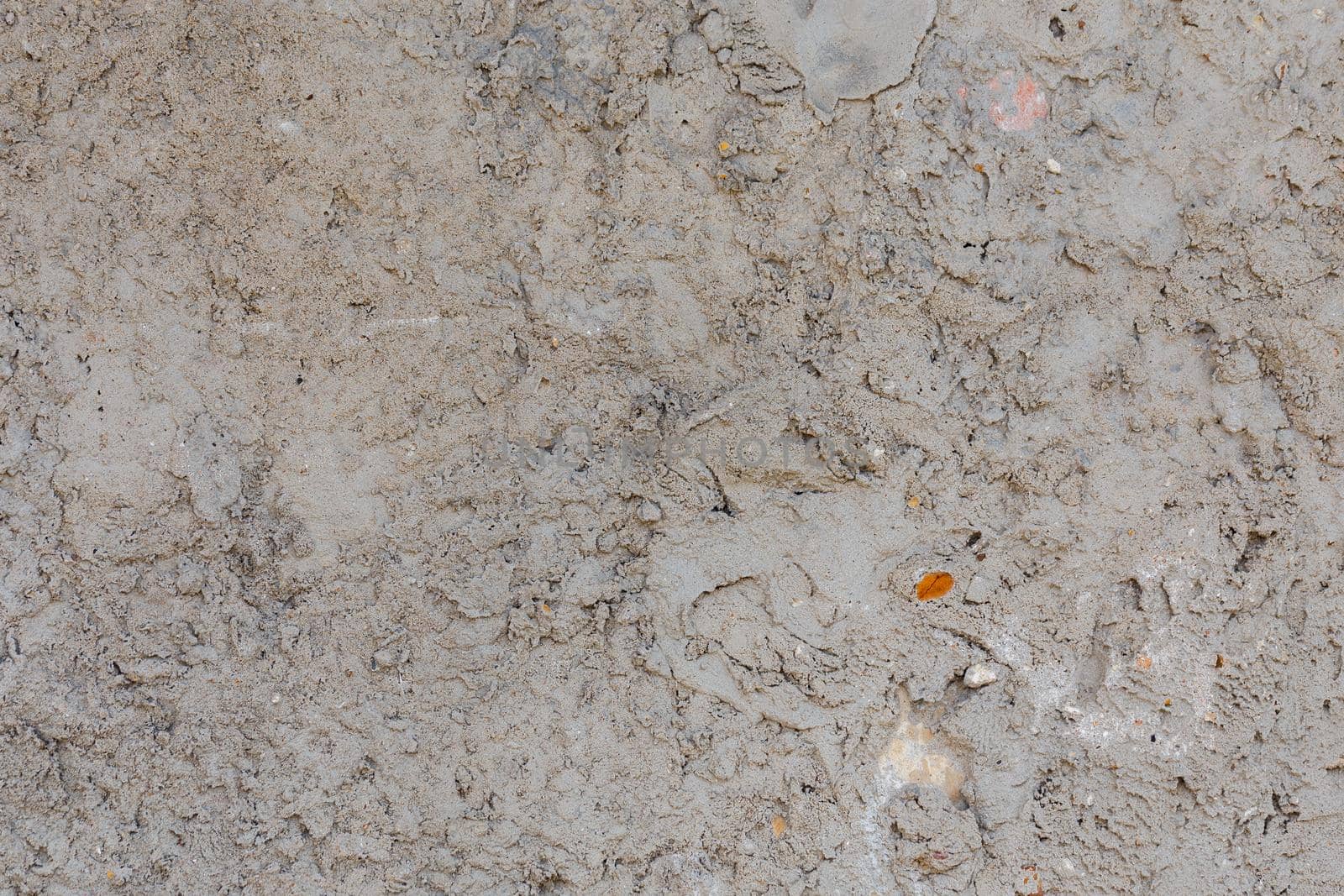rough and bumpy cement industrial wall - flat texture and background.