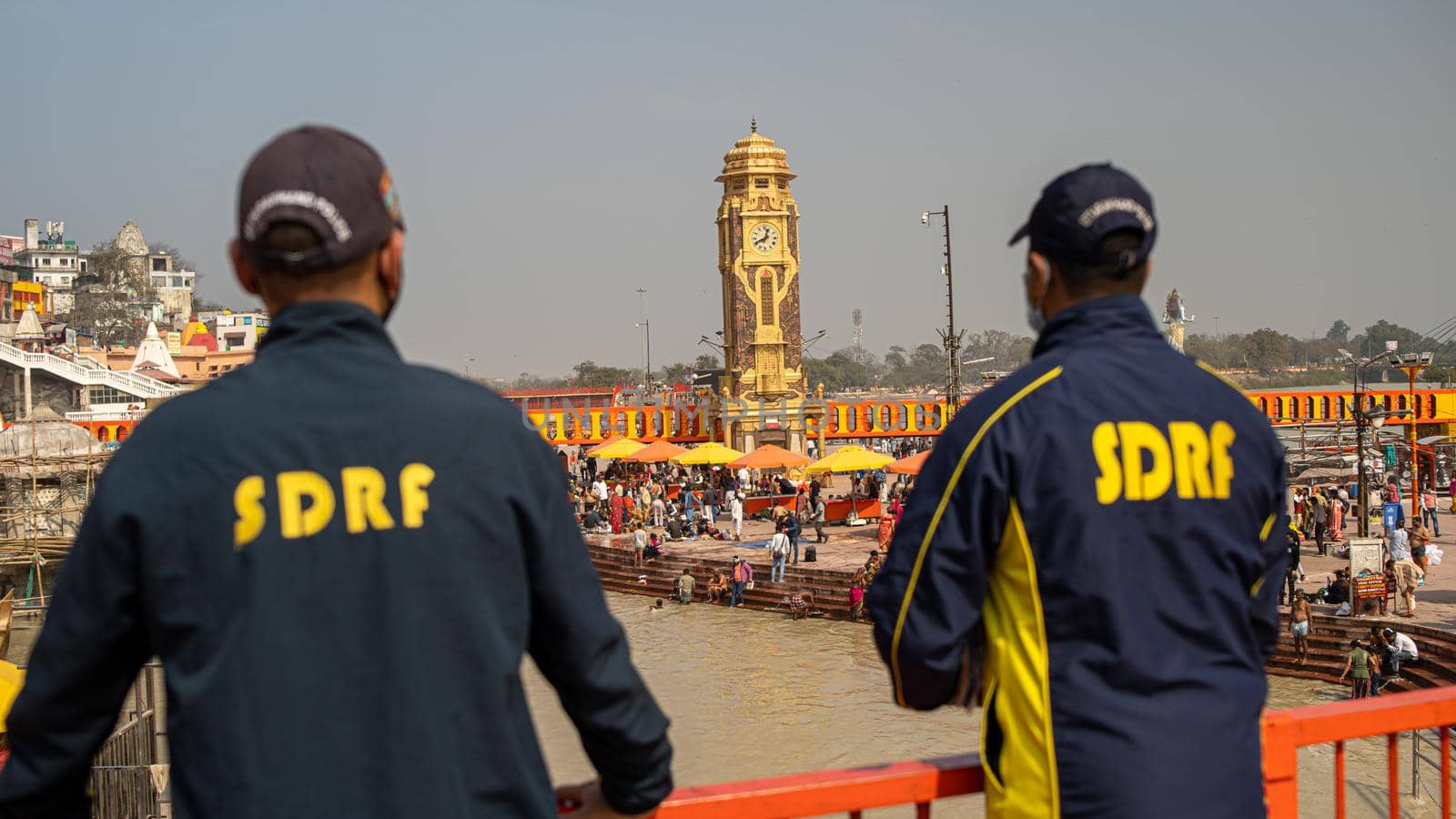 Policemen spreading awareness of protection from Coronavirus to stay safe from Coronavirus during Maha Kumbh 2021 by stocksvids