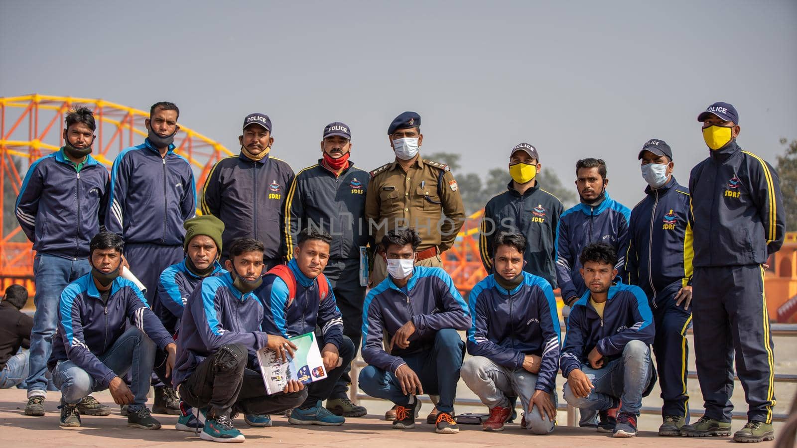 Policemen spreading awareness of protection from Coronavirus to stay safe from Coronavirus during Maha Kumbh 2021 by stocksvids