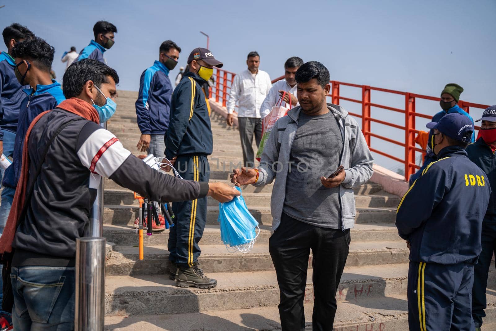 Haridwar, Uttarakhand India April 06, 2021. Policemen spreading awareness of protection from Coronavirus to stay safe from Coronavirus during Maha Kumbh 2021. Apple prores 422 High-quality 4k footage.